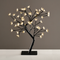"TREE WITH FLOWERS OF SILICONE" 36LED ΛΑΜΠΑΚ ΜΕ ΑΝΤΑΠΤΟΡΑ(24V DC)ΘΕΡΜΟ ΛΕΥΚΟ IP20 45cm 3m ΜΑΥΡΟ X1036141